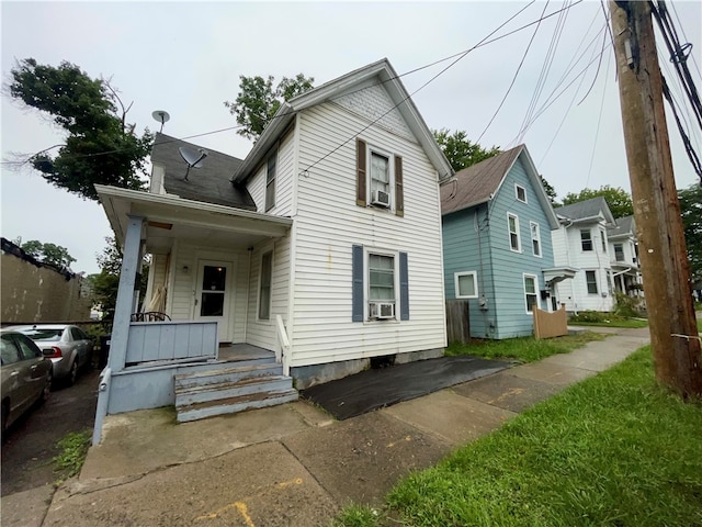 view of front of property featuring cooling unit