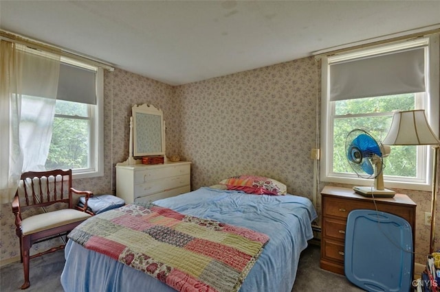 46745 Rte 1 S, Alexandria, NY 13607 - carpeted bedroom featuring multiple windows and wallpapered walls