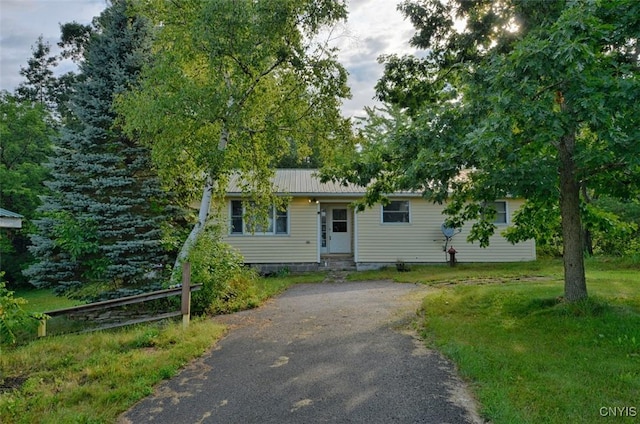 46745 Rte 1 S, Alexandria, NY 13607 - single story home featuring asphalt driveway and a metal roof