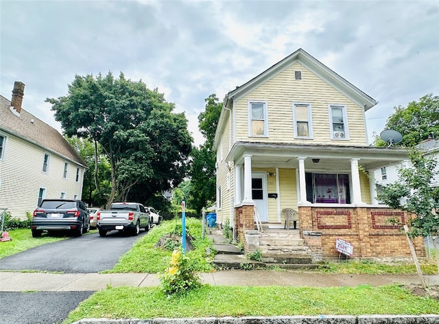 view of front of house with covered porch