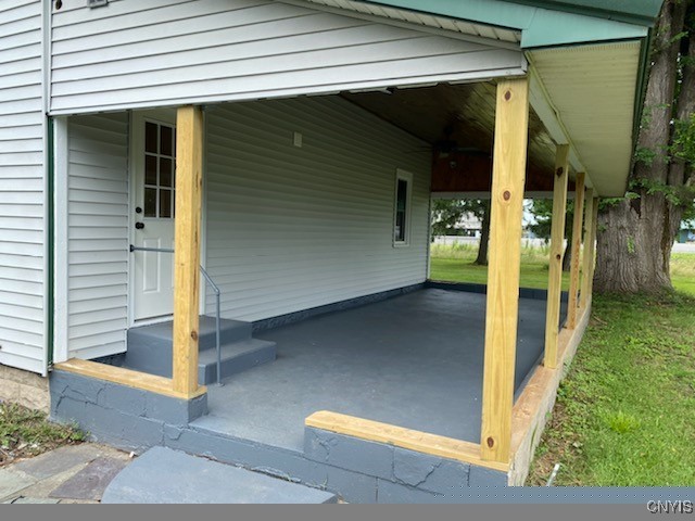 view of parking / parking lot with a carport