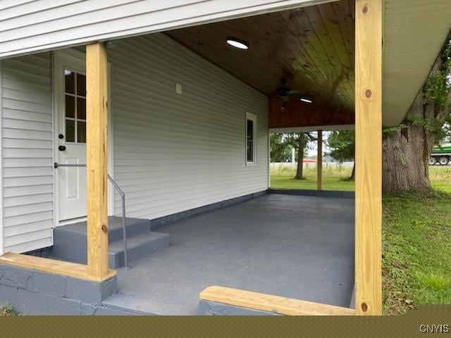 view of patio / terrace featuring ceiling fan