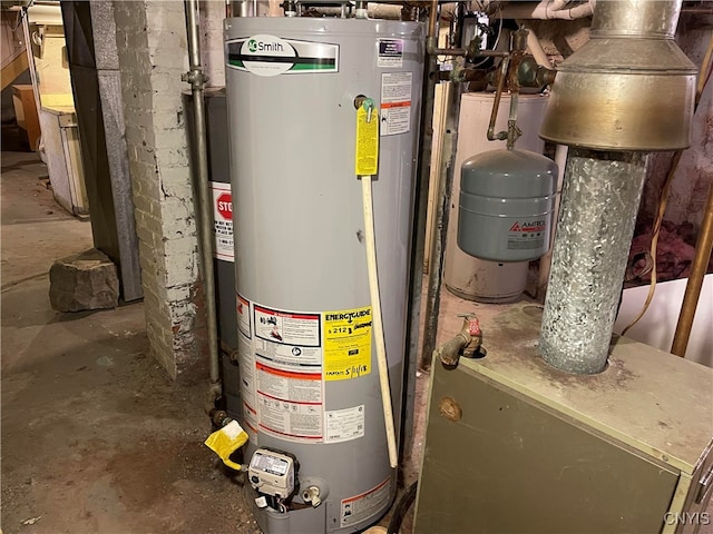 utility room with gas water heater