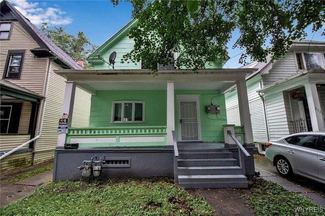 view of front of property featuring covered porch