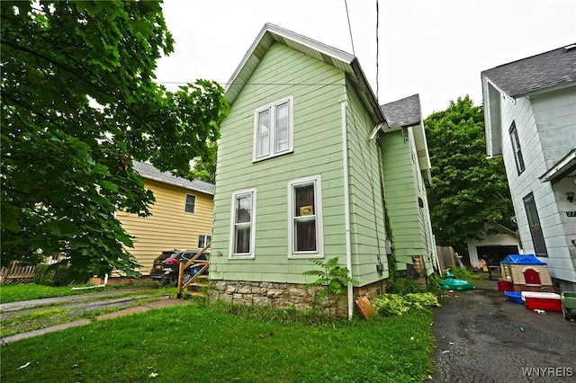 exterior space with a lawn