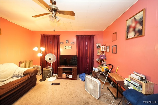 bedroom featuring ceiling fan and carpet floors