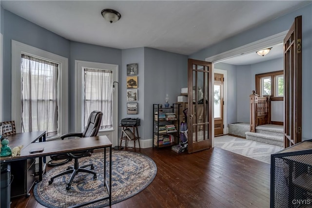 office space with hardwood / wood-style flooring and french doors