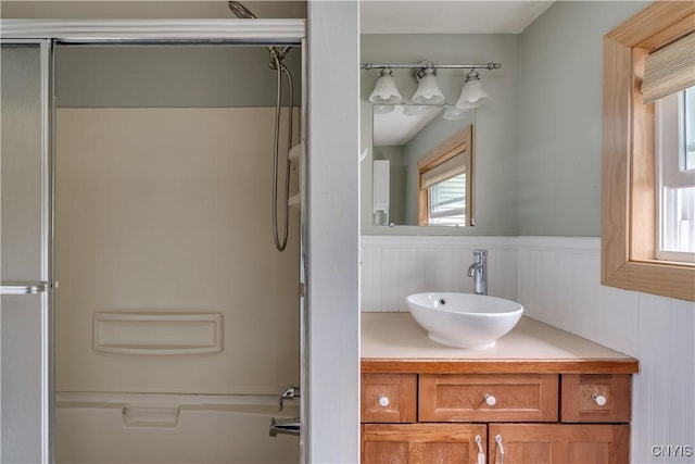 bathroom featuring vanity and bathtub / shower combination