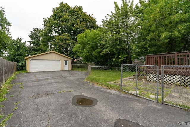 view of front of property with an outbuilding and a garage