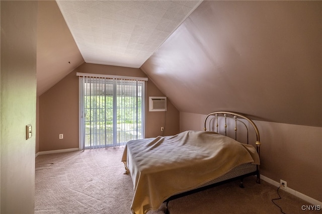 carpeted bedroom featuring lofted ceiling, access to outside, and a wall unit AC