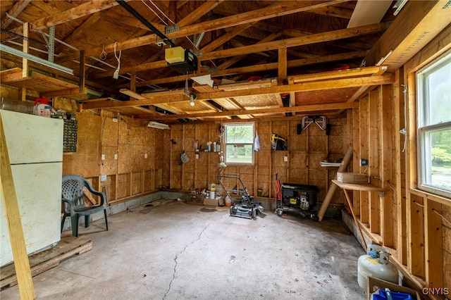 garage with white refrigerator