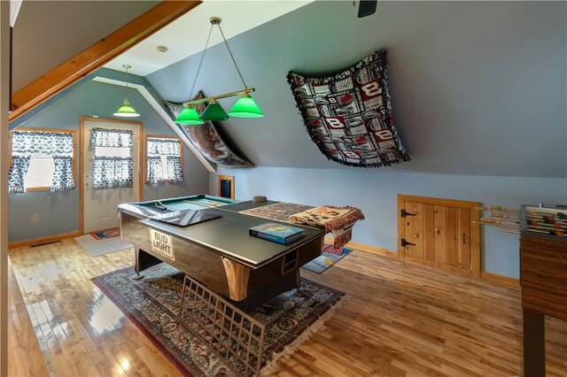 rec room featuring billiards, vaulted ceiling, and light hardwood / wood-style floors