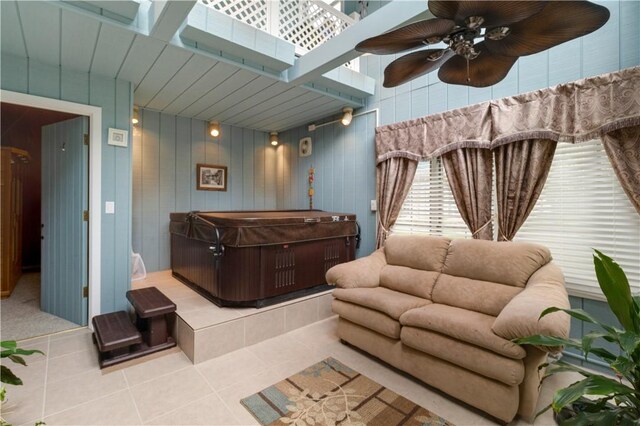 interior space featuring ceiling fan