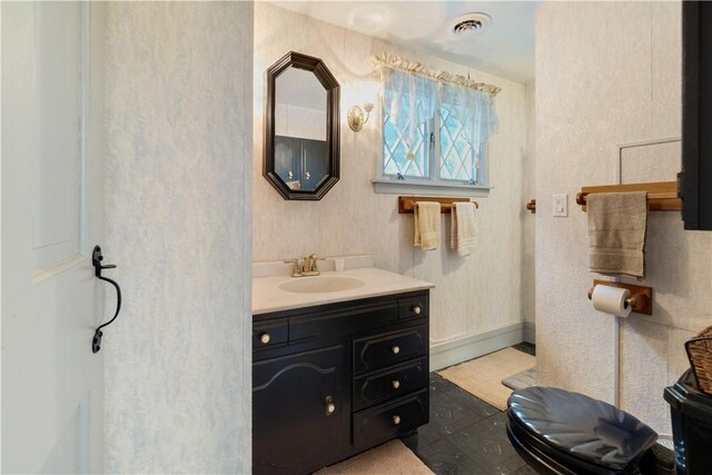 bathroom featuring vanity and tile patterned flooring