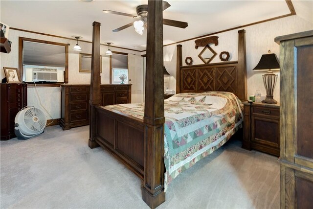 carpeted bedroom featuring ceiling fan and cooling unit