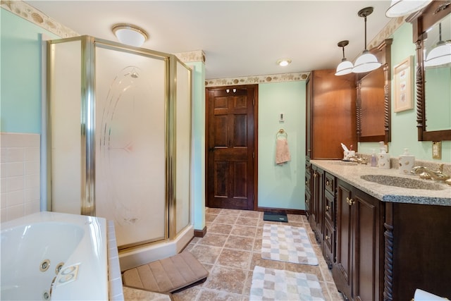 bathroom with vanity, shower with separate bathtub, and tile patterned flooring