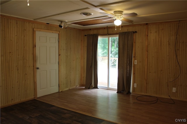 spare room with ceiling fan and hardwood / wood-style floors