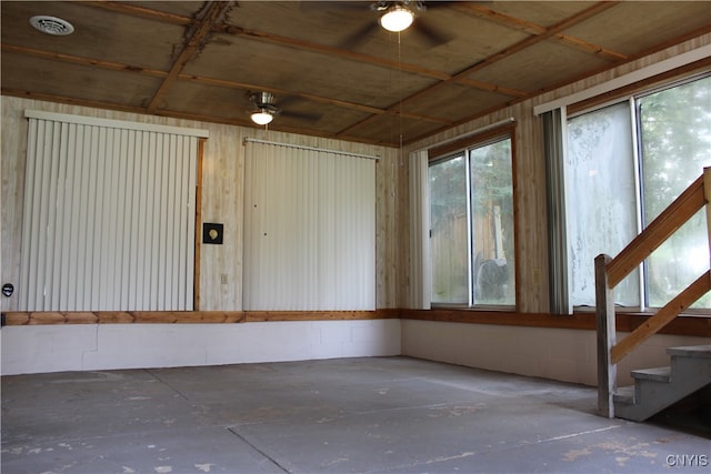 interior space featuring ceiling fan