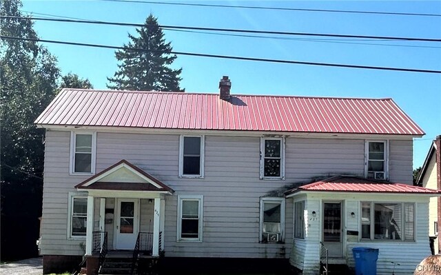 view of front of home featuring cooling unit