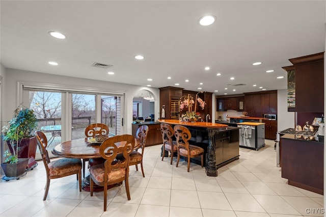 dining space with light tile patterned flooring