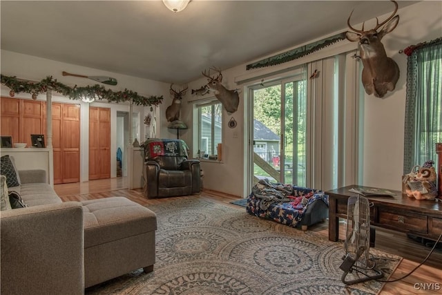 sitting room featuring light hardwood / wood-style flooring