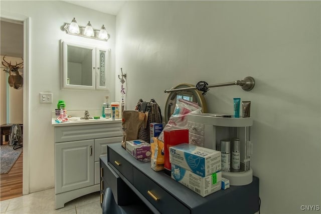 bathroom with vanity and tile patterned flooring