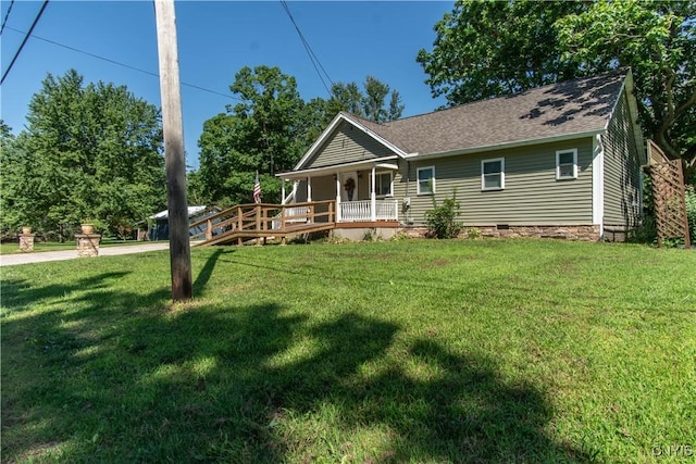 view of front of house with a porch and a front lawn