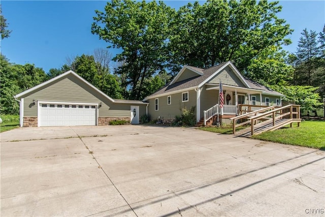 view of front of house with a garage and a porch