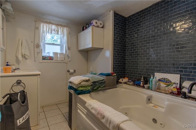 bathroom with tile patterned flooring, crown molding, sink, and a tub to relax in