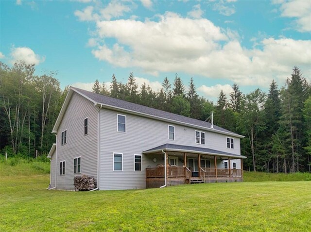 1724 Calhoun Hill Rd, Andes, NY 13731 - rear view of house featuring covered porch, a yard, and a forest view