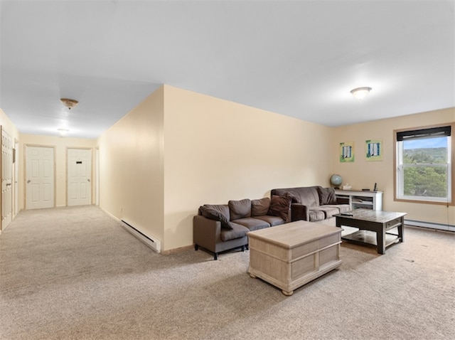 living room with a baseboard radiator and light colored carpet