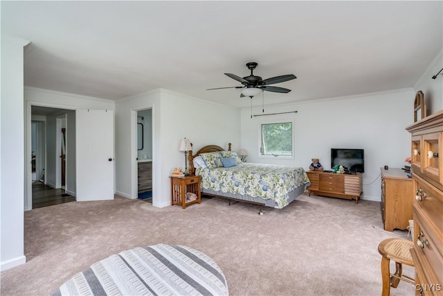 bedroom with a ceiling fan, carpet, baseboards, and crown molding