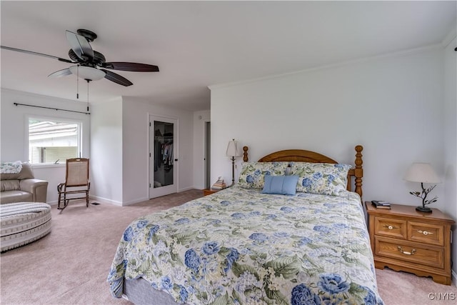 bedroom featuring baseboards, crown molding, a ceiling fan, and light colored carpet