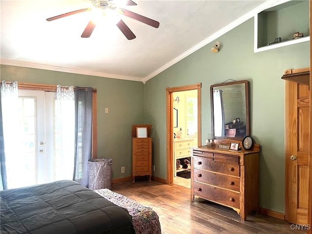 bedroom featuring ensuite bath, crown molding, ceiling fan, french doors, and hardwood / wood-style flooring