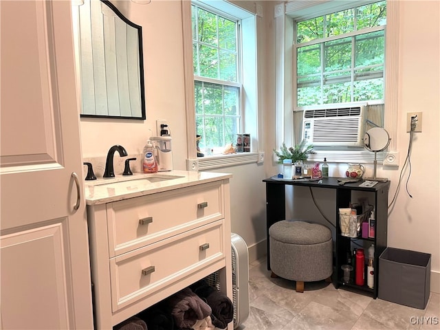 bathroom with tile patterned floors, vanity, and cooling unit