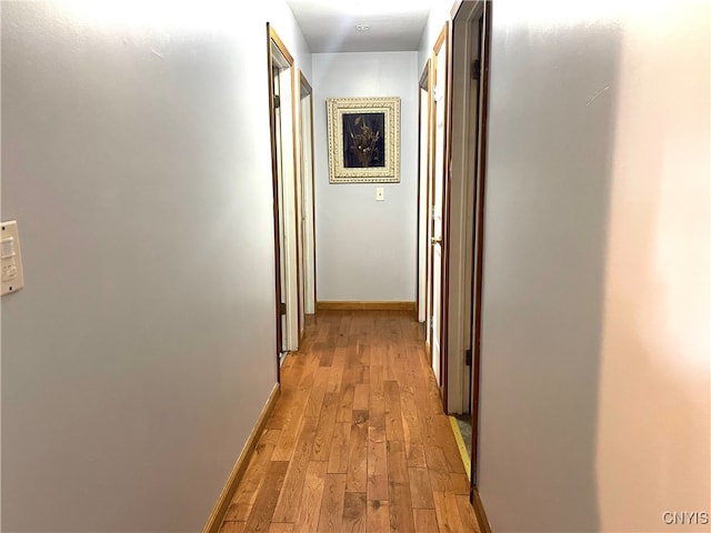 hallway featuring light wood-type flooring