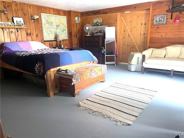 bedroom featuring wooden walls