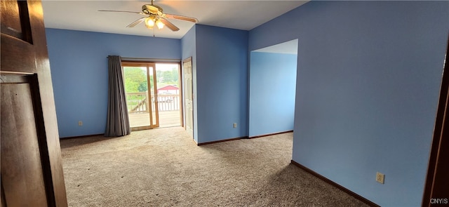 interior space with ceiling fan