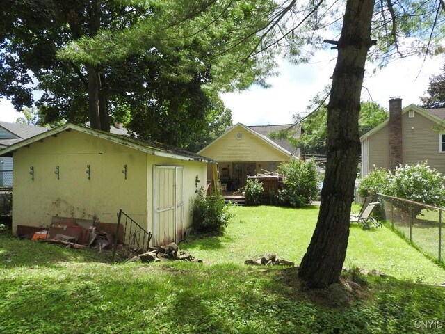 view of yard with a wooden deck