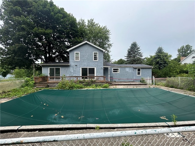 exterior space with a swimming pool side deck