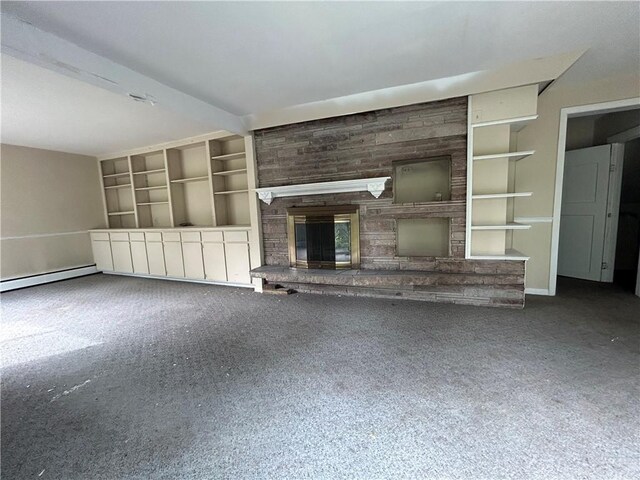 unfurnished living room featuring a large fireplace, built in features, and carpet floors