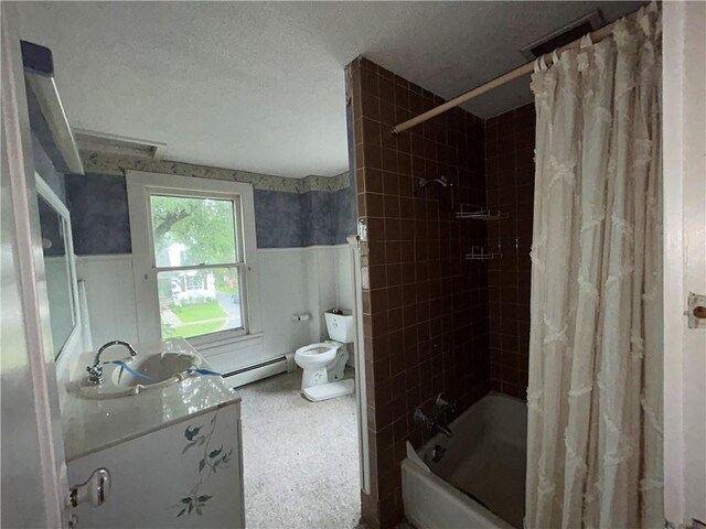 full bathroom featuring shower / bathtub combination with curtain, a baseboard radiator, toilet, and vanity