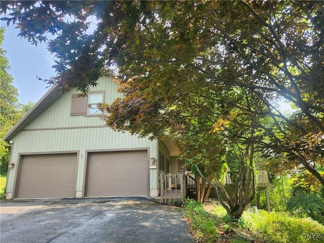 1666 Buffs Blf, Skaneateles, NY 13152 - obstructed view of property with driveway and a garage
