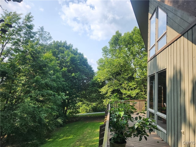 view of yard featuring a wooden deck