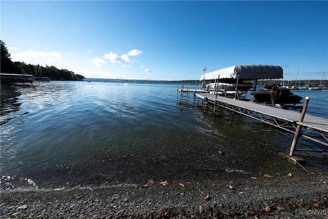 1666 Buffs Blf, Skaneateles, NY 13152 - dock featuring a water view and boat lift