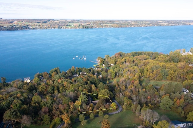 birds eye view of property featuring a water view