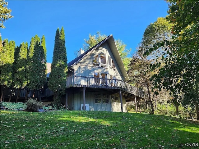 1666 Buffs Blf, Skaneateles, NY 13152 - back of property featuring a yard, a chimney, and a wooden deck