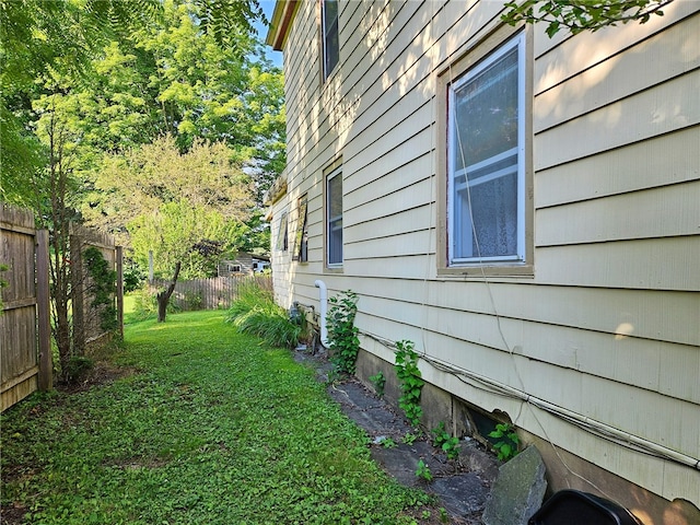 18 Wheeler St, Deposit, NY 13754 - view of home's exterior with a yard and fence