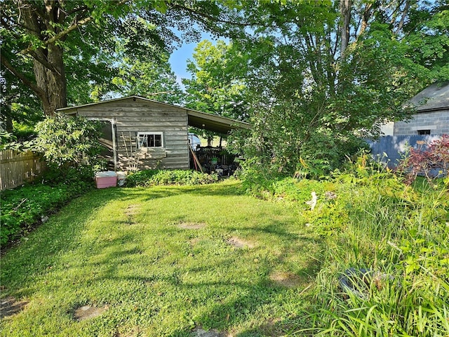 18 Wheeler St, Deposit, NY 13754 - view of yard with an attached carport and fence
