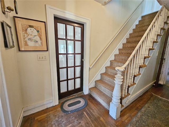 18 Wheeler St, Deposit, NY 13754 - entryway featuring stairs, parquet flooring, and baseboards